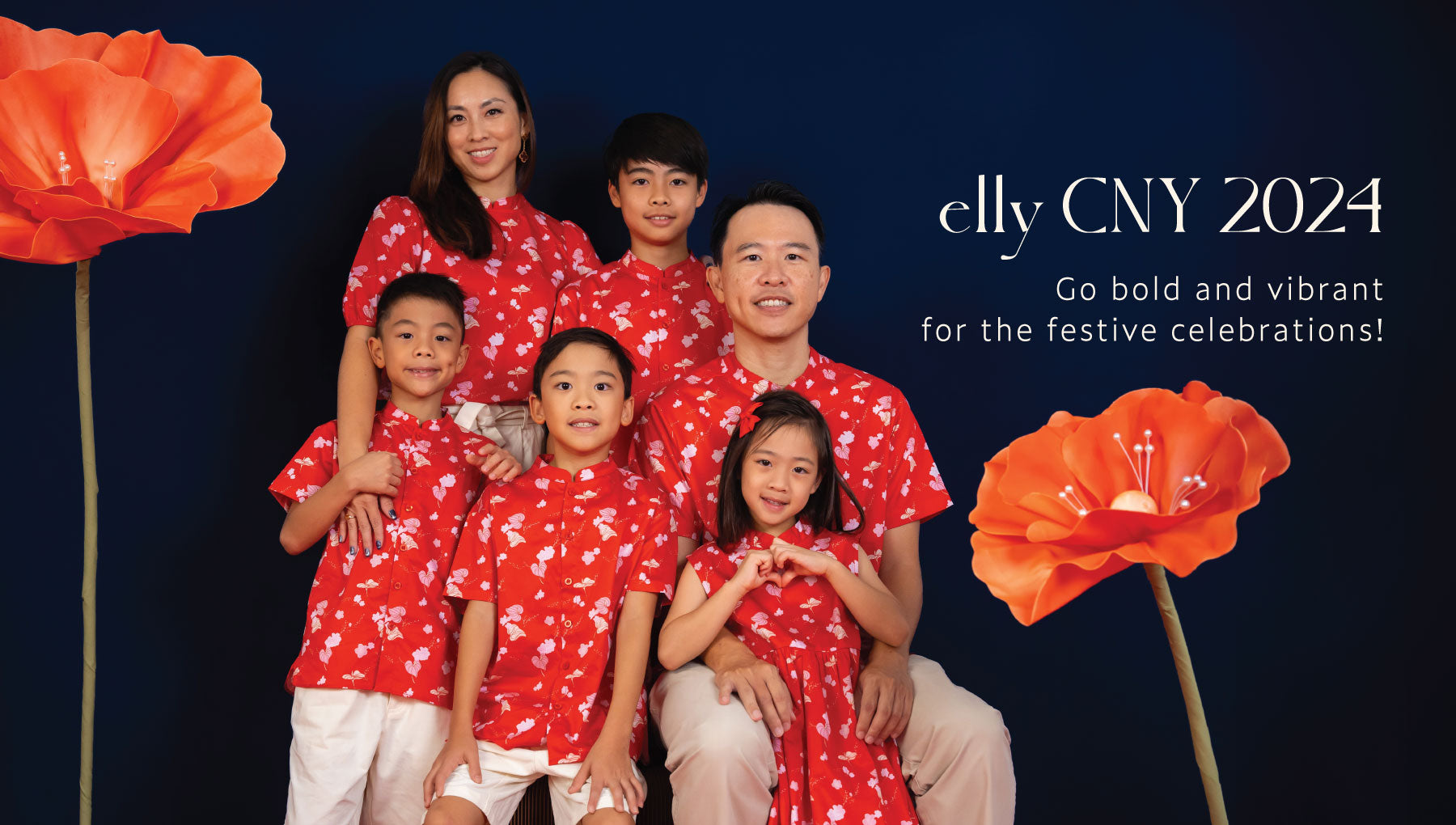 CNY 2024 family portrait with bold red outfits