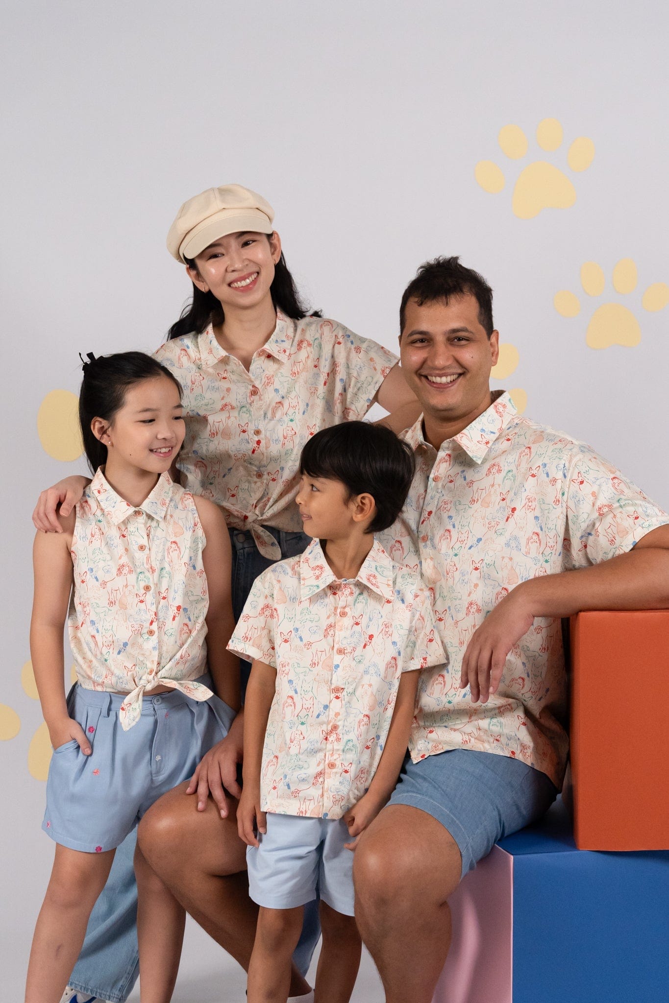 Family wearing matching floral shirts