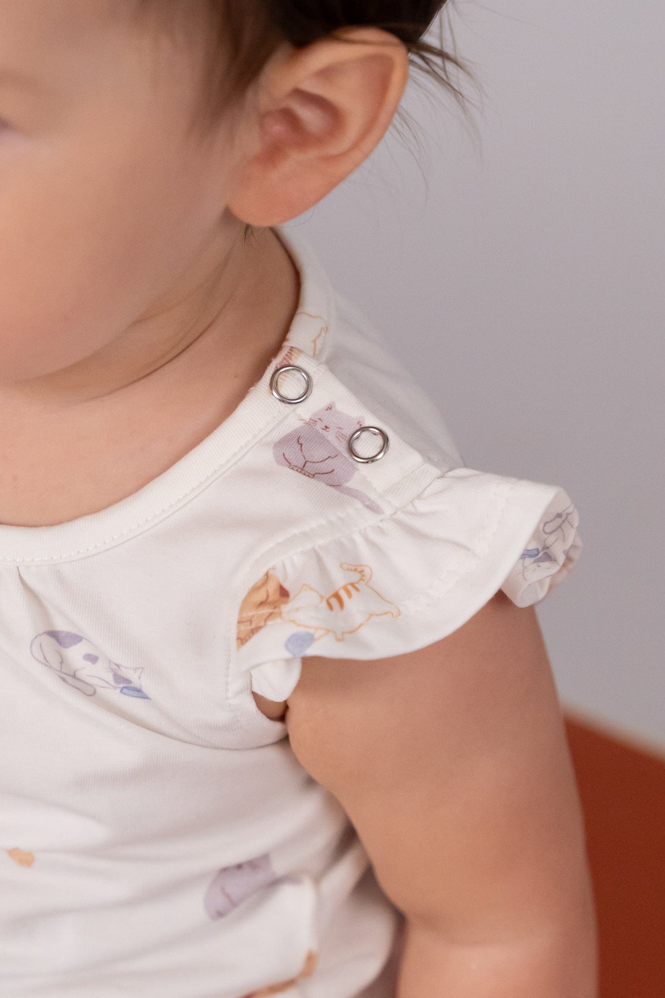 Baby wearing white floral top (DSC03758)