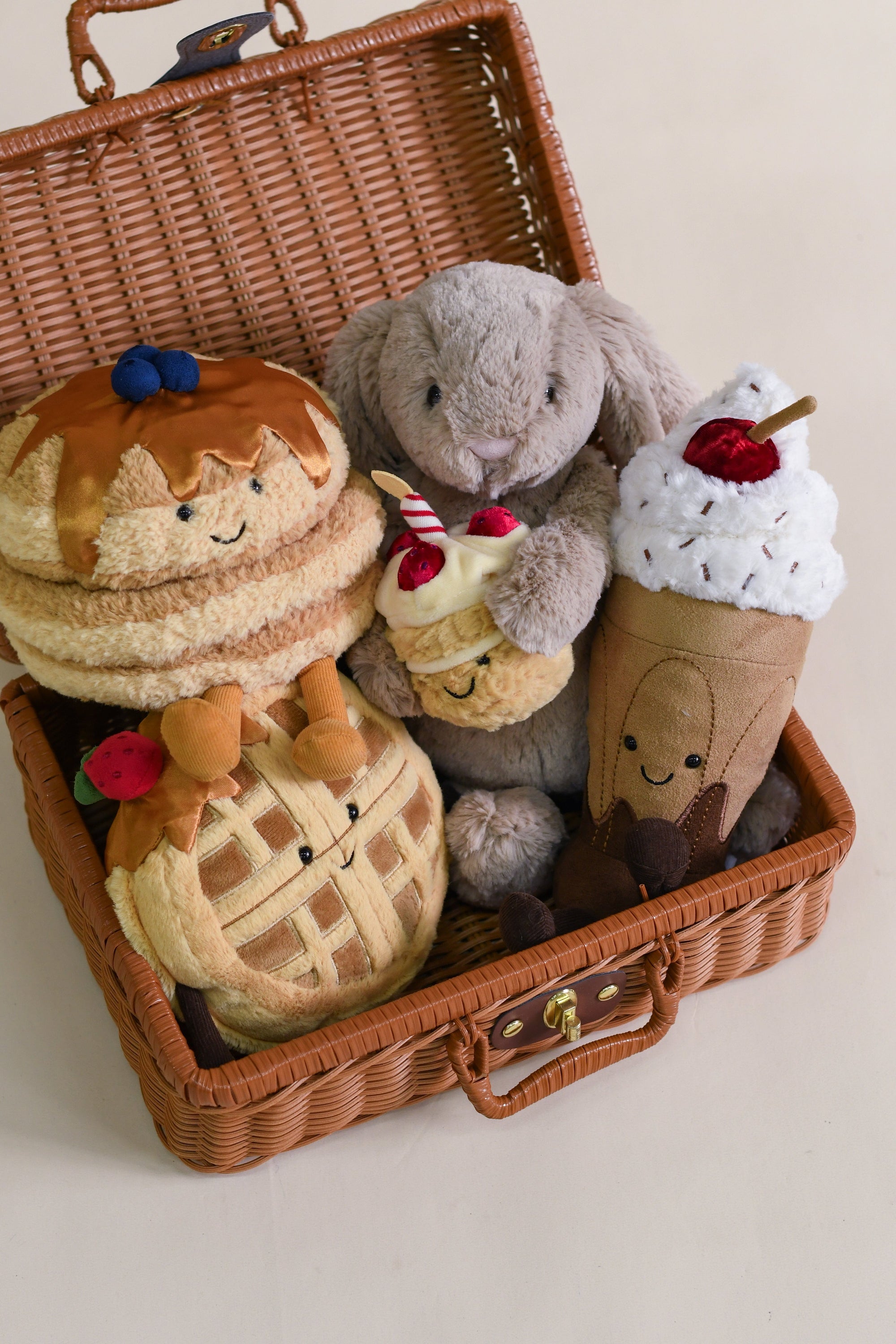 Picnic basket with plush food and bunny