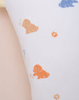 Close-up of pillow with puppy pattern