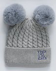 Grey knitted beanie with double pom-poms