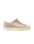 Side profile view of kids' Native Jefferson slip-on shoes in a sparkly Chameleon Pink gradient with a biodegradable plant-based glitter and a white shell sole.
