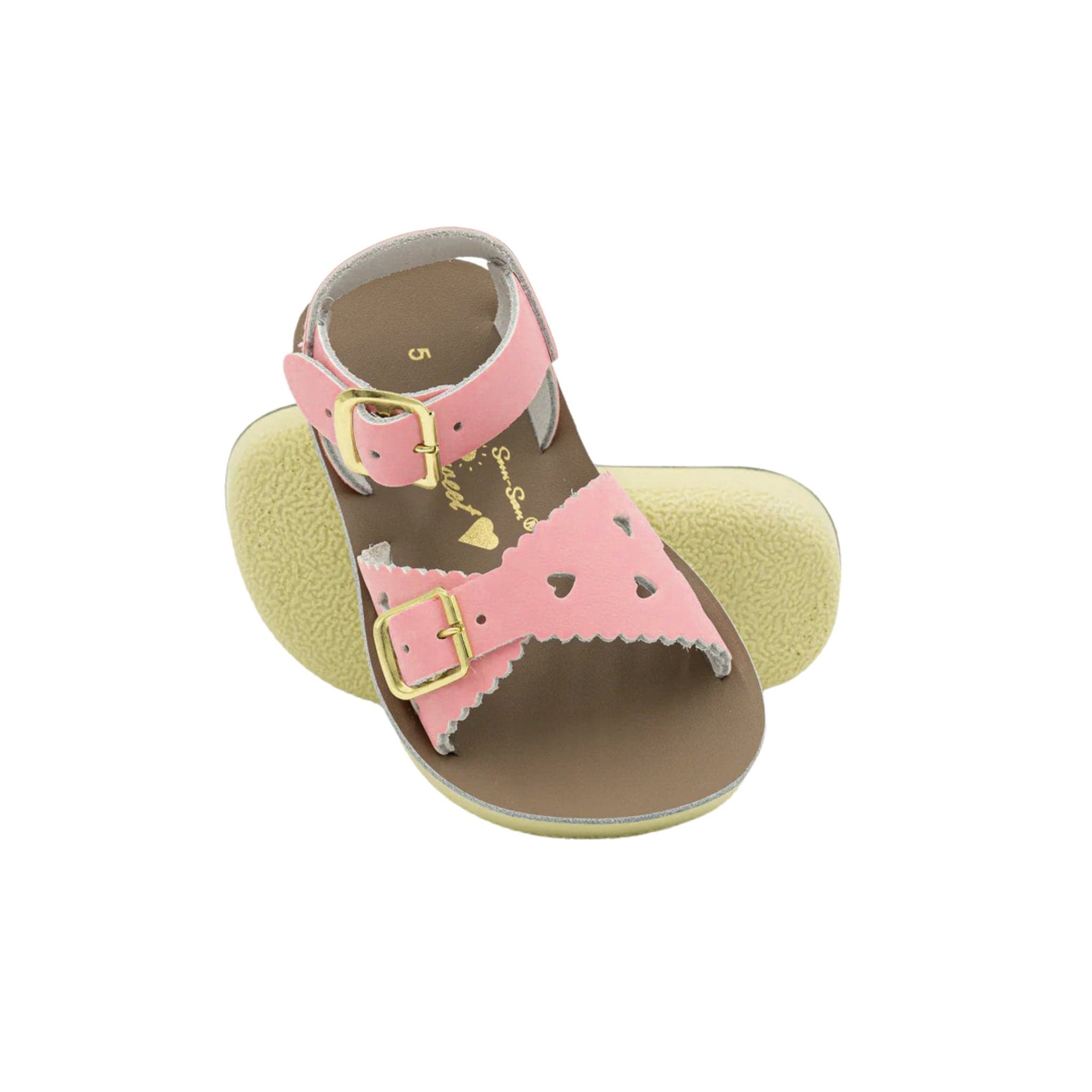 Pink baby sandals with heart details