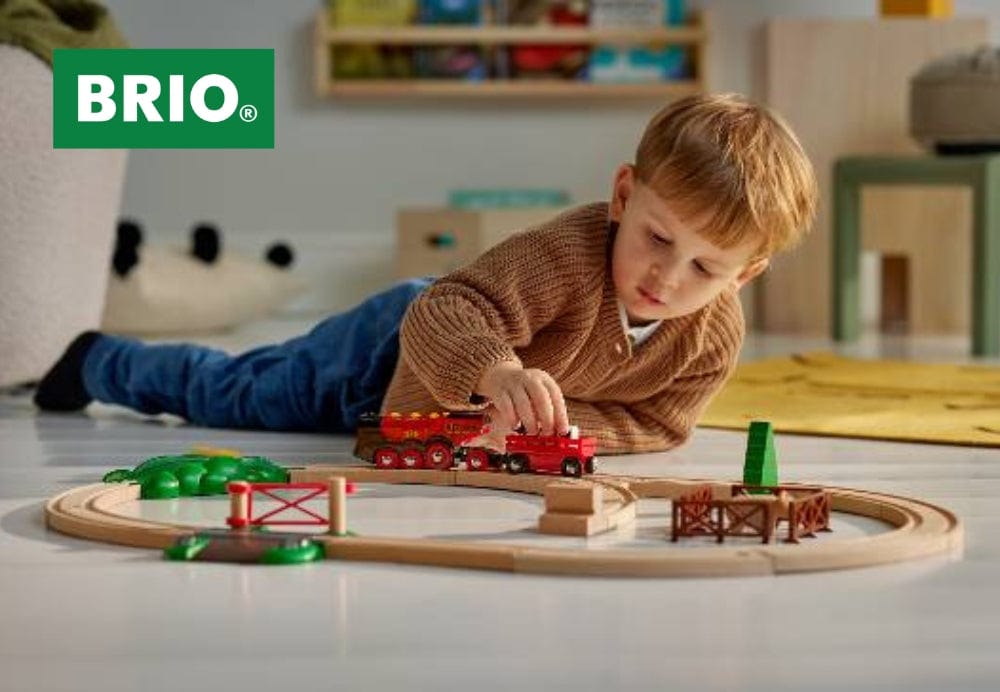 BRIO wooden train set with child