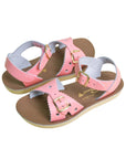 Pink children's sandals with gold buckle