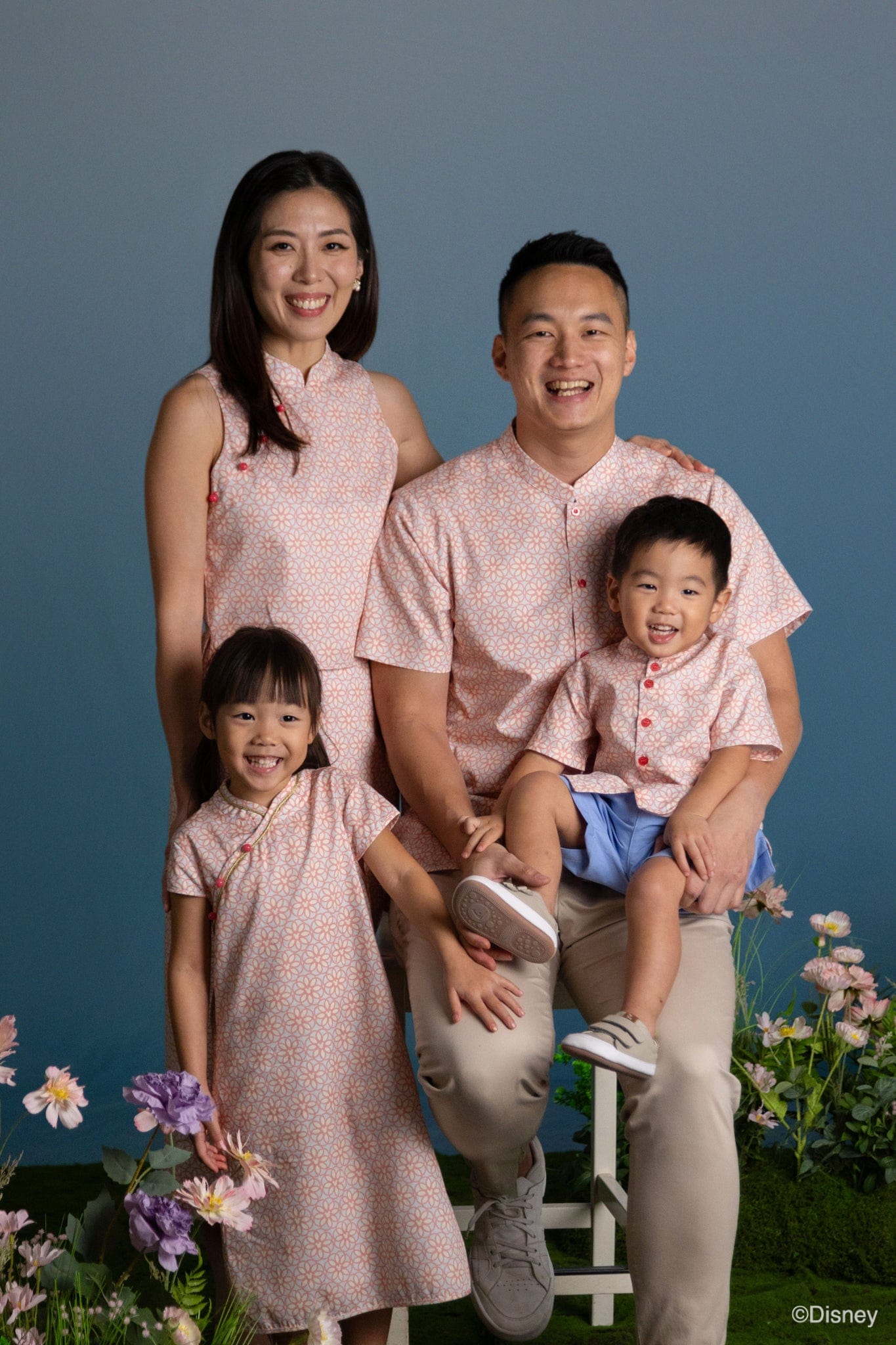 Family portrait in matching pink outfits