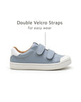 Close-up of the double velcro straps on the Tide Blue Ramp Sneakers designed for easy wear.