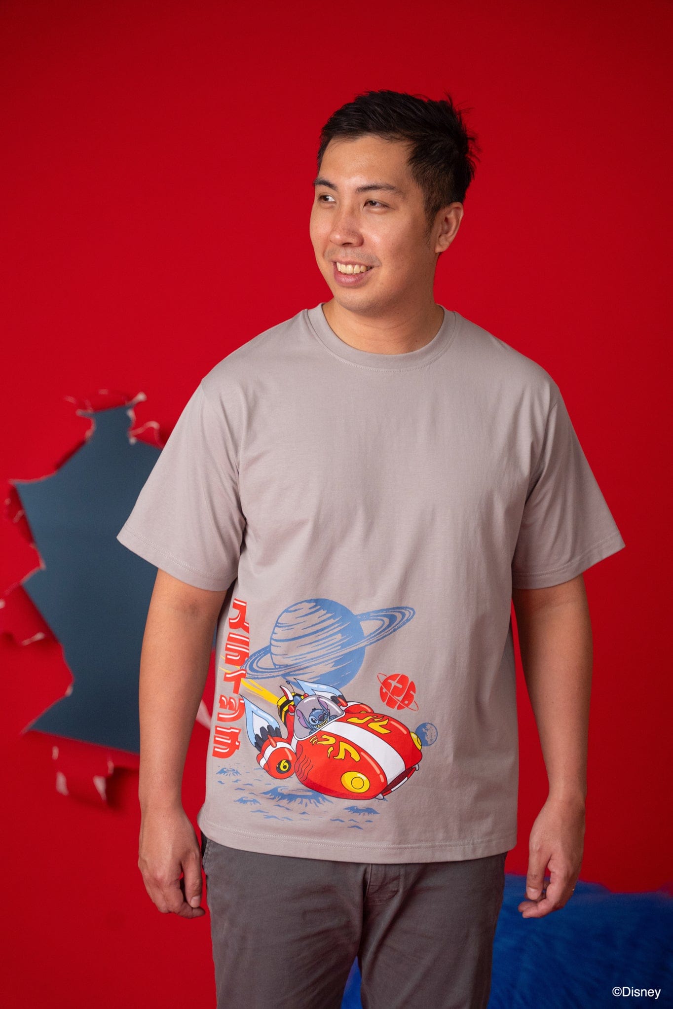Man wearing Stitch space tee shirt