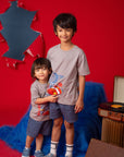 Two boys wearing Stitch t-shirts