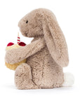 Bashful beige bunny with birthday cake