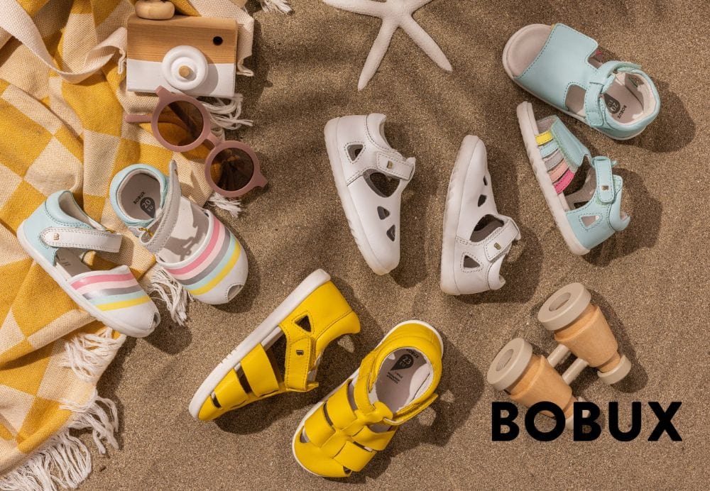 Bobux sandals collection banner on sand