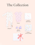 Baby product collection including a sleepsuit, onesie, hooded bath towel, ducky bath toy, and organic cotton swaddle.