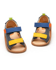Angled view of a pair of Tip Toey Joey Explore Sandals in Slate Blue / Caja / Blue Tang