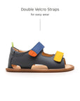 Side view of Tip Toey Joey Explore Sandals in Slate Blue / Caja / Blue Tang with double velcro straps