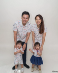 Family of four wearing matching Nautical Mickey design