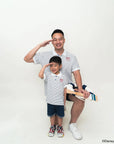 father and son in matching stripes sailor mickey polo tees