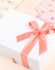 Luxury personalised baby gift box with ribbon packaging