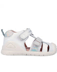 White sandal with colorful accents on a white background
