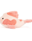 Plush toy fish with a heart pattern
