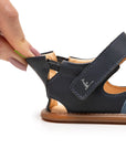 Side view of Tip Toey Joey Flipper Sandals in Denim / Blue Tang / Navy