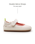 Side view of Tip Toey Joey Gaia Green Mary Janes in Lona Creme / Lona Salmao with double velcro straps