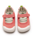 Angled view of a pair of Tip Toey Joey Gaia Green Mary Janes in Lona Salmao