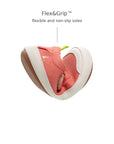 Tip Toey Joey Gaia Green Mary Janes in Lona Salmao bending at the toe to show the flexible sole