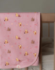 Jersey Blanket - Pink Harvest Pooh folded over cot