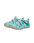 Bird's-eye view of the Bright Aqua sandals, displaying the contoured light pink footbed designed for natural arch support.