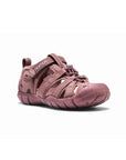 Three-quarter front view of the youth sandal showing the protective closed-toe box and hook-and-loop strap closure.