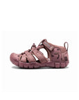 Right-side profile of the mauve youth sandal highlighting the thick, contoured midsole and open-vented design for breathability.