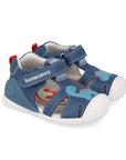 pair of Navy children's shoe with dino design and velcro straps