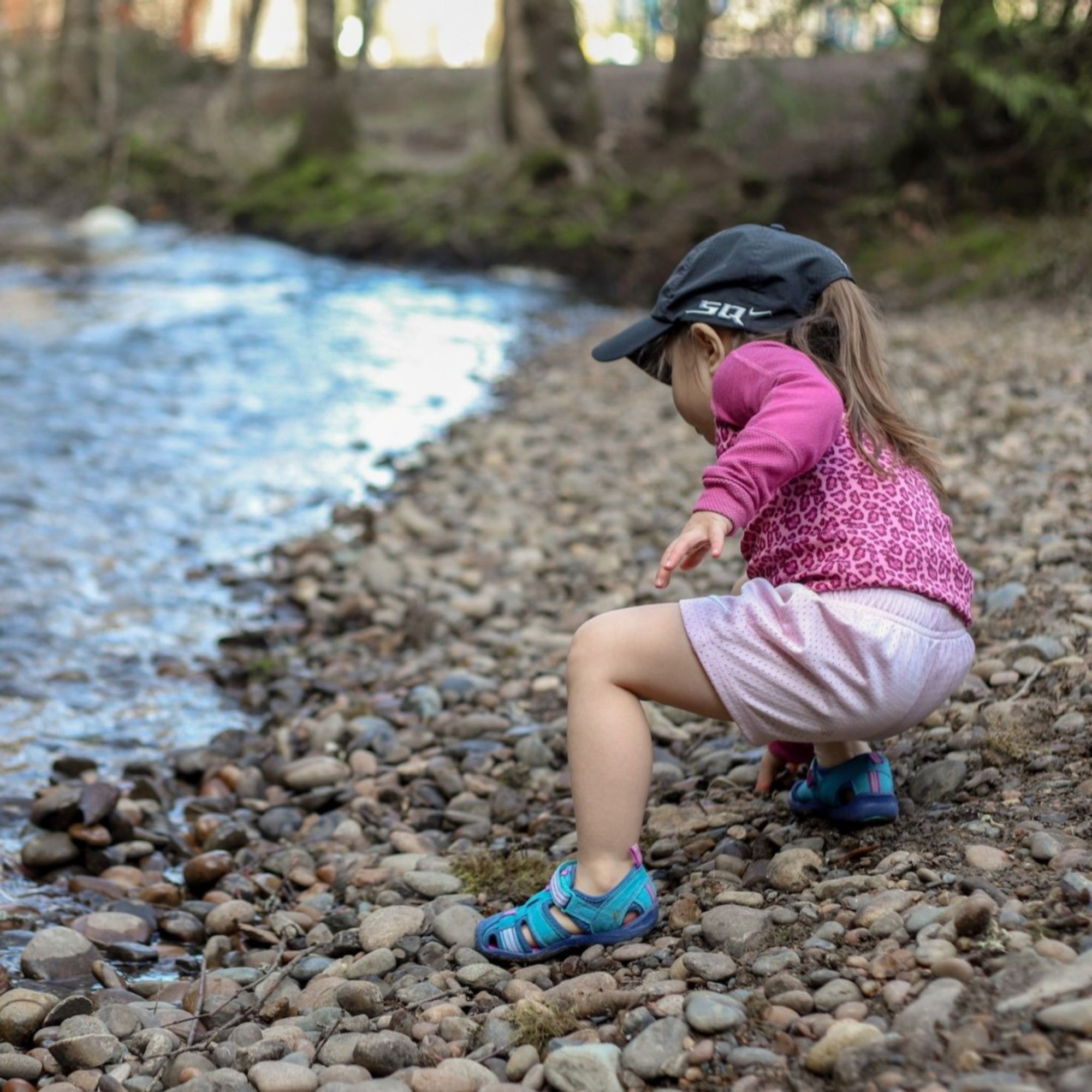 Child playing by stream in pedipedsaharagallery3