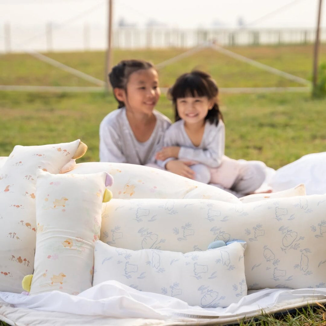 Kids with pillows in gallery