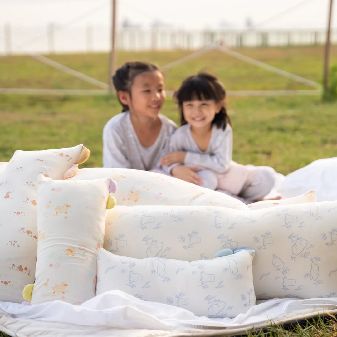 Kids with pillows in gallery