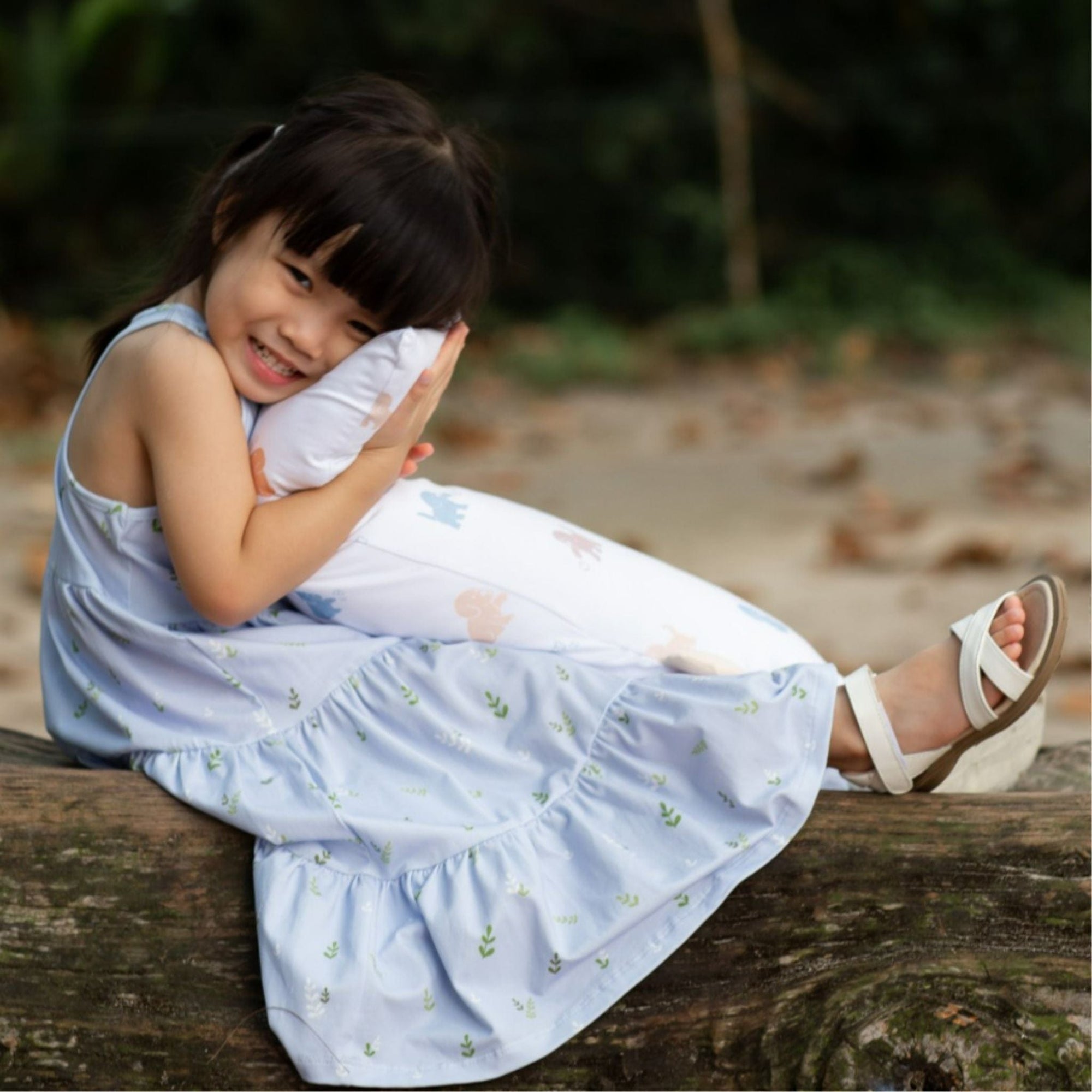 Girl hugging pillow, from pillow gallery