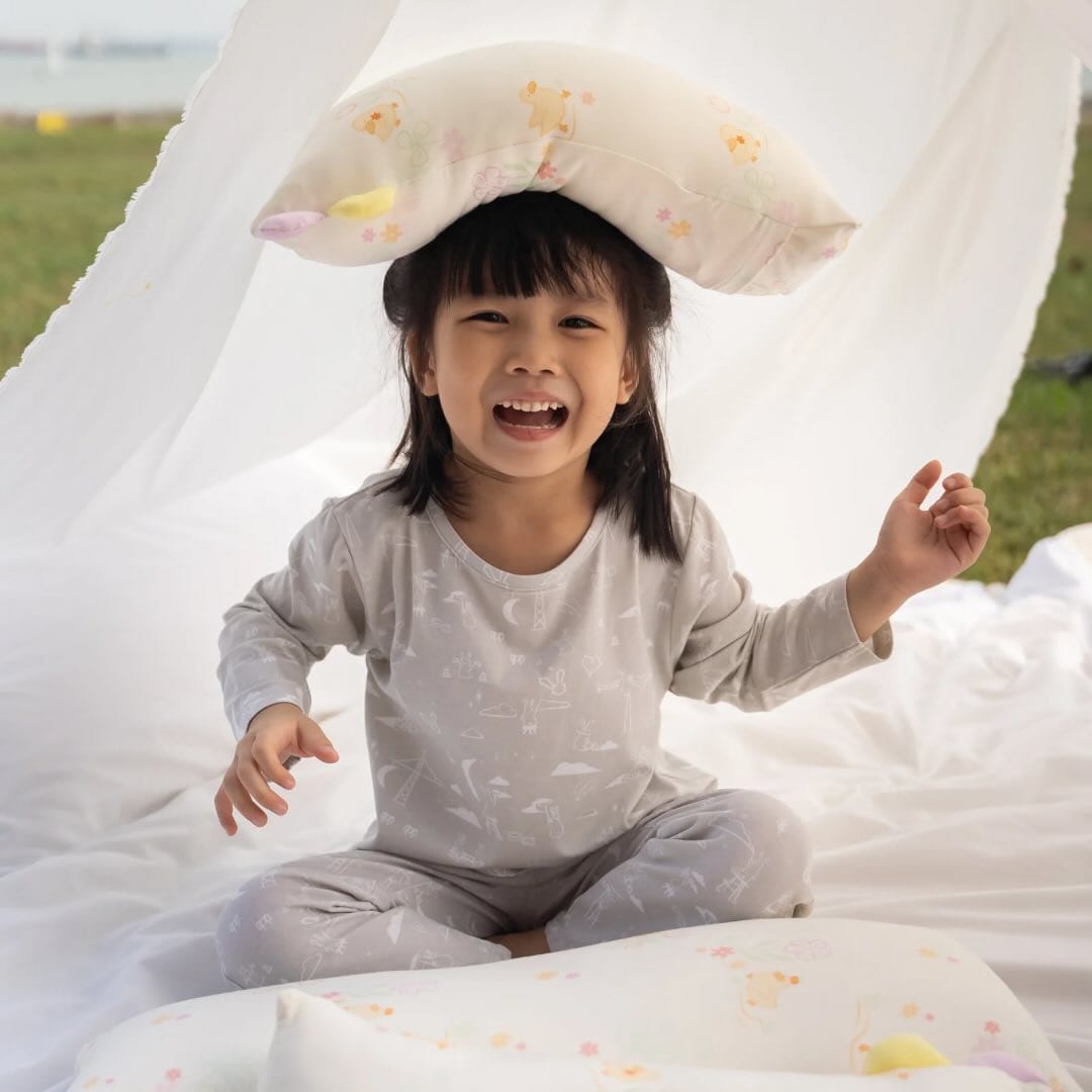 Happy girl with pillow from pillow gallery 5