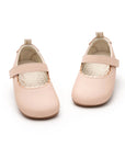 Sole and detail view of Tip Toey Joey Roundy Shoes in Papaya Cream / Metallic Salmon