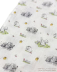 close up of breezy with pooh swaddle