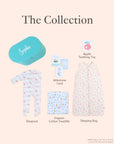 Baby product collection including a sleepsuit, organic cotton swaddle, sleeping bag, and teething toy on a beige background.