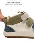Close-up of the Stretch & Stay elastic heel on the baby Metropoly sneaker for a secure and easy fit.