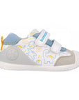 Children's shoe with dinosaur design on a white background