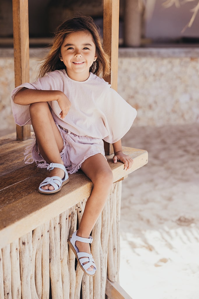 Beach club Sophie in pale blue outfit