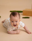 Caleb Romper Dandelion Pooh crawling
