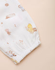 Caitlyn Romper Dandelion Pooh closeup