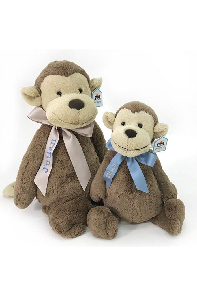 Ribbon Personalisation Sample - Beige Ribbon with Cornflower Blue Text and Light Blue Ribbon with Silver Text
