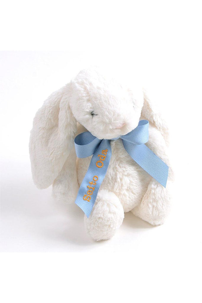 Ribbon Personalisation Sample - Light Blue Ribbon with Orange Text