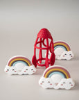 Red rocket with rainbow decorations