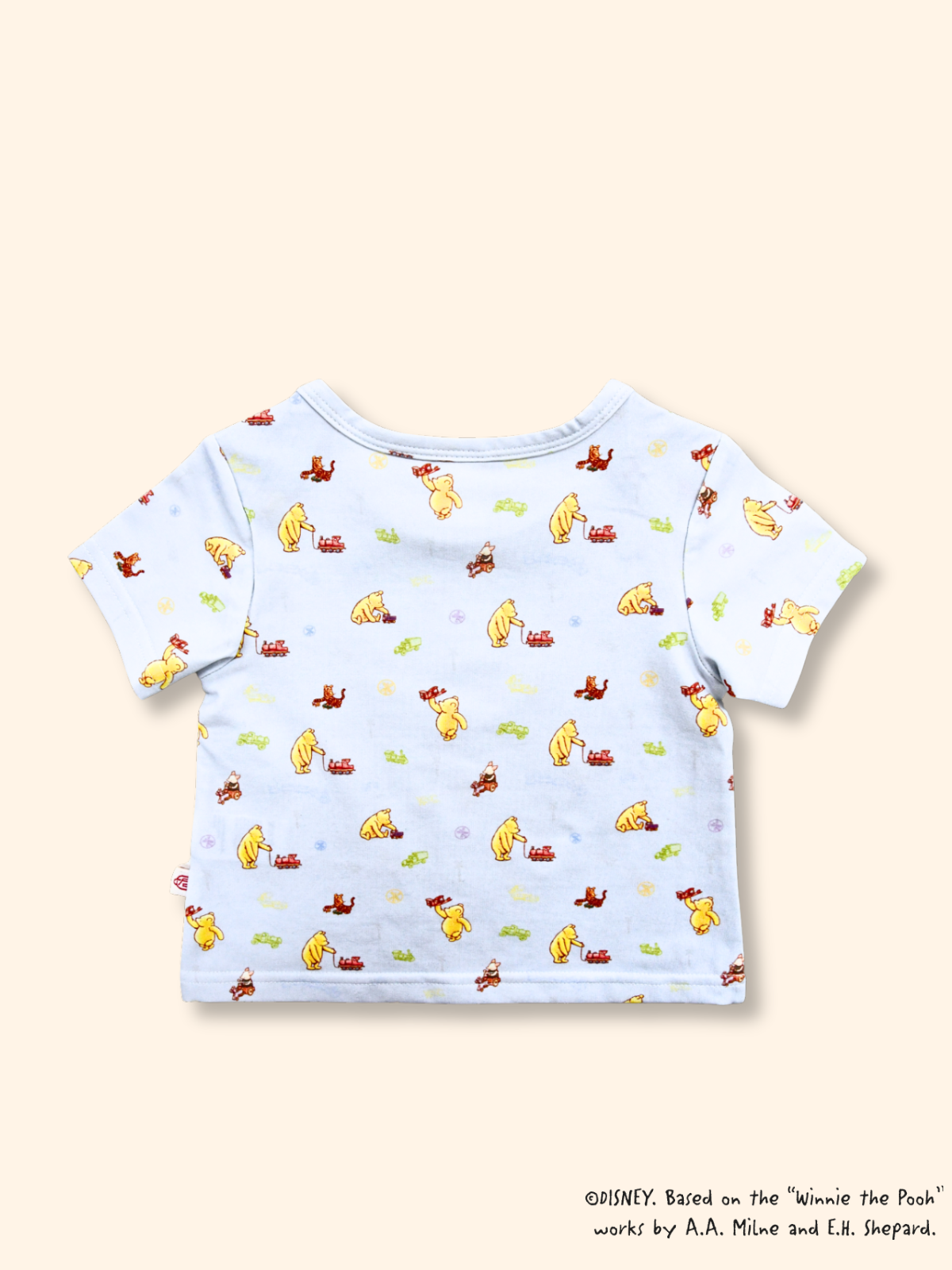Back view of baby tee with Classic Pooh print, soft breathable cotton fabric
